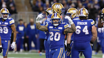 Nov 9, 2024; Winnipeg, Manitoba, CAN;  Winnipeg Blue Bombers running back Brady Oliveira (20) celebrates his run during the first half of the game between the Winnipeg Blue Bombers and the Saskatchewan Roughriders at Princess Auto Stadium. Mandatory Credit: Bruce Fedyck-Imagn Images