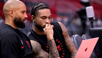 Dec 29, 2024; Houston, Texas, USA; Houston Rockets guard Cam Whitmore (7, right) warms up prior to the game against the Miami Heat at Toyota Center. Mandatory Credit: Erik Williams-Imagn Images
