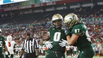 Sep 9, 2023; Tampa, Florida, USA; South Florida Bulls tight end Jayson Littlejohn (0) celebrates a touchdown with Tight end Gunnar Greenwald (87) against Florida A&M Rattlers during the second quarter at Raymond James Stadium. Mandatory Credit: Morgan Tencza-USA TODAY Sports