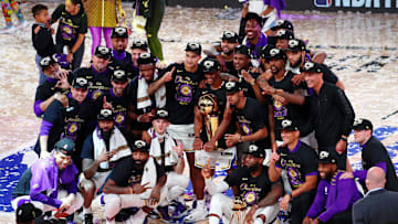 Oct 11, 2020; Lake Buena Vista, Florida, USA; The Los Angeles Lakers pose for a photo after their win over the Miami Heat after game six of the 2020 NBA Finals at AdventHealth Arena. The Los Angeles Lakers won 106-93 to win the series. Mandatory Credit: Kim Klement-Imagn Images