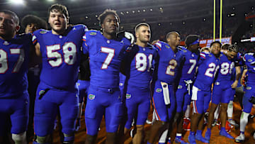 Nov 16, 2024; Gainesville, Florida, USA; Florida Gators quarterback DJ Lagway (2) and teammates celebrate after they beat the LSU Tigers at Ben Hill Griffin Stadium. Mandatory Credit: Kim Klement Neitzel-Imagn Images