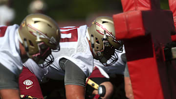 FSU's offensive line works out during their opening practice for fall camp at the Al Dunlap Training Facility Monday, Aug. 6, 2018. 

636691563153527519-B49I3032.jpg