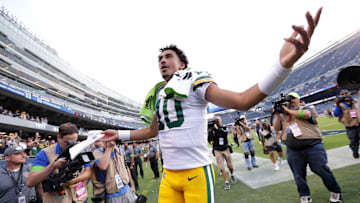 Green Bay Packers quarterback Jordan Love (10) celebrates a victory against the Chicago Bears as he leaves the field during their football game Sunday, September 10, 2023, at Soldier Field in Chicago, Ill. Green Bay won 38-20.