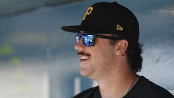 Sep 14, 2024; Pittsburgh, Pennsylvania, USA;  Pittsburgh Pirates pitcher Paul Skenes (30) smiles in the dugout against the Kansas City Royals during the eighth inning at PNC Park. Mandatory Credit: Charles LeClaire-Imagn Images