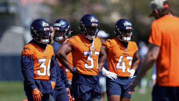 May 23, 2024; Englewood, CO, USA; Denver Broncos running back Audric Estime (37) and running back Tyler Badie (36) and running back Blake Watson (43) during organized team activities at Centura Health Training Center. Mandatory Credit: Isaiah J. Downing-USA TODAY Sports