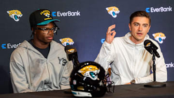 The Jacksonville Jaguars’ first-round pick, Colorado Buffaloes wide receiver and defensive back Travis Hunter, left, listens as General Manager James Gladstone, right. Answers questions during a press conference Friday, March 25, 2025 at Miller Electric Center in Jacksonville, Fla.