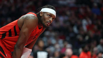 Feb 13, 2024; Portland, Oregon, USA;  Portland Trail Blazers forward Jerami Grant (9) stares down a referee about a missed call against the Minnesota Timberwolves in the third quarter at Moda Center. Mandatory Credit: Jaime Valdez-USA TODAY Sports