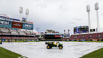 May 26, 2024; Cincinnati, Ohio, USA; A general view of the tarp on the field during a rain delay in the sixth inning in the game between the Los Angeles Dodgers and the Cincinnati Reds at Great American Ball Park. Mandatory Credit: Katie Stratman-Imagn Images