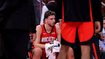 Oct 27, 2025; Houston, Texas, USA; Houston Rockets center Alperen Sengun (28) sits on the bench during a timeout against the Brooklyn Nets during the second quarter at Toyota Center. Mandatory Credit: Erik Williams-Imagn Images
