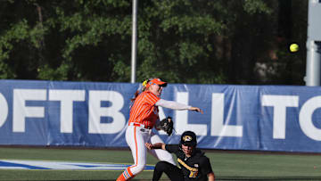 May 9, 2024; Auburn, AL, USA;  Florida Gators infielder Mia Williams (11) throws to first after the force out on Missouri Tigers catcher Julia Crenshaw (11) during the SEC Softball Championship game at Jane B. Moore Field. Mandatory Credit: John Reed-Imagn Images