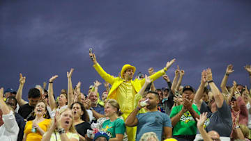 Savannah Bananas owner Jesse Cole celebrates with the fans during the first game of the Banana Ball Championship series on Thursday, October 2, 2025 at Historic Grayson Stadium.
