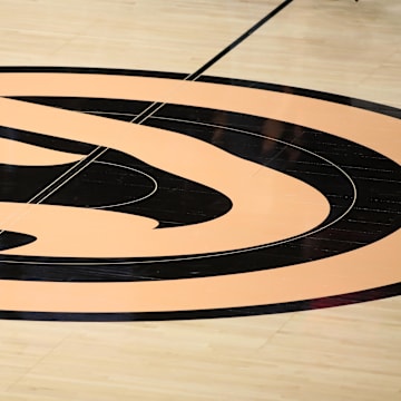 Nov 20, 2019; Atlanta, GA, USA; A general view of the Atlanta Hawks logo at midcourt before a game between the Hawks and the Milwaukee Bucks at State Farm Arena. Mandatory Credit: Jason Getz-Imagn Images