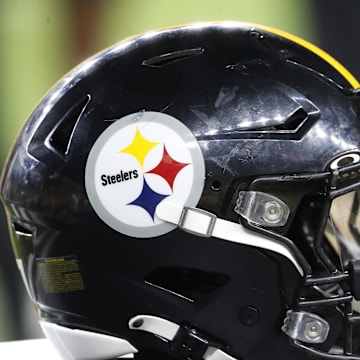 Aug 9, 2024; Pittsburgh, Pennsylvania, USA;  A Pittsburgh Steelers helmet sits on an equipment trunk during the game against the Houston Texans during the fourth quarter at Acrisure Stadium. Mandatory Credit: Charles LeClaire-Imagn Images