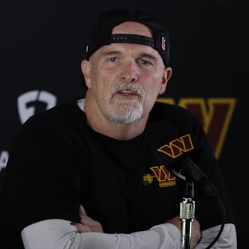 Jul 23, 2025; Ashburn, VA, USA; Washington Commanders head coach Dan Quinn speaks with the media prior to practice on day one of training camp at OrthoVirginia Training Center at Commanders Park. Mandatory Credit: Geoff Burke-Imagn Images
