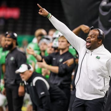 Dec 18, 2021; New Orleans, LA, USA;  Marshall Thundering Herd head coach Charles Huff reacts to a play against Louisiana-Lafayette Ragin Cajuns during the first half of the 2021 New Orleans Bowl at Caesars Superdome. Mandatory Credit: Stephen Lew-USA TODAY Sports