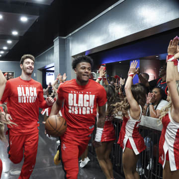 Feb 28, 2023; Houston, Texas, USA; Houston Rockets guard Jalen Green (4) and center Alperen Sengun (28) run towards the court before the game against the Denver Nuggets at Toyota Center. Mandatory Credit: Troy Taormina-USA TODAY Sports