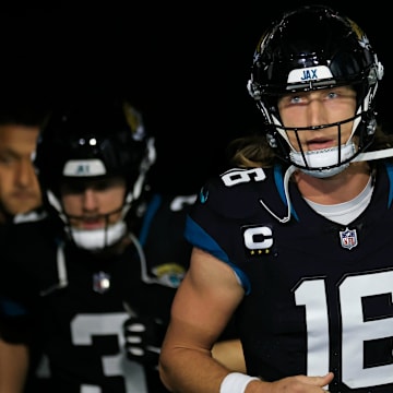 Jacksonville Jaguars quarterback Trevor Lawrence (16) leads his team onto the field before a regular season NFL football matchup Monday, Dec. 4, 2023 at EverBank Stadium in Jacksonville, Fla. The Cincinnati Bengals defeated the Jacksonville Jaguars 34-31 in overtime. [Corey Perrine/Florida Times-Union]