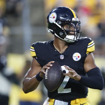 Aug 17, 2024; Pittsburgh, Pennsylvania, USA;  Pittsburgh Steelers quarterback Justin Fields (2) looks to pass against the Buffalo Bills during the second quarter at Acrisure Stadium. Mandatory Credit: Charles LeClaire-Imagn Images