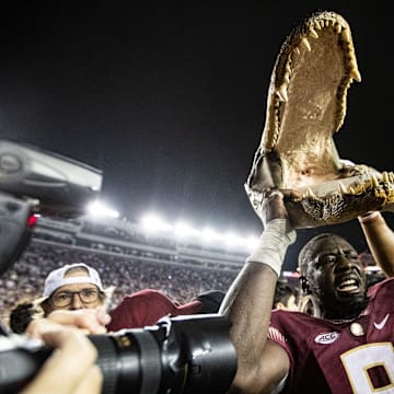 Members of the Florida State Seminoles football team and fans celebrate the team   s victory over the Florida Gators at Doak Campbell Stadium on Friday, Nov. 25, 2022.

Fsu V Uf Second Half1297