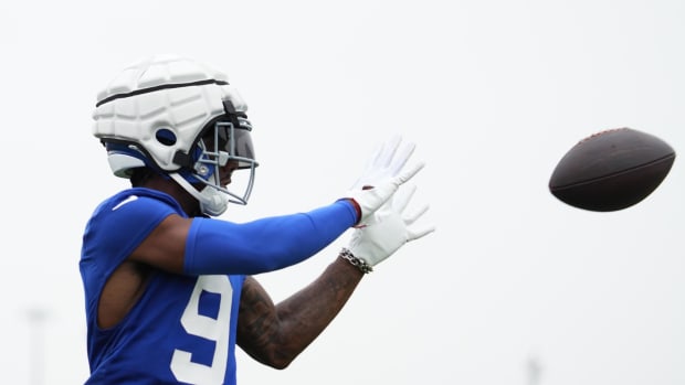 New York Giants wide receiver Malik Nabers (9) catches a pass during training camp