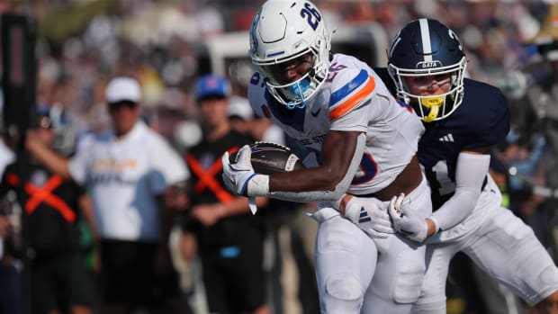 Aug 31, 2024; Statesboro, Georgia, USA; Boise State Broncos running back Sire Gaines (26) drives for yardage Georgia Southern