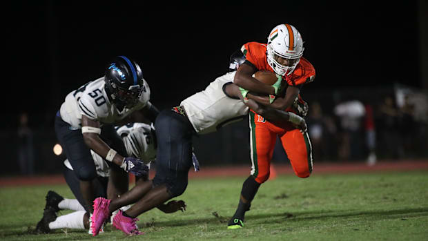 Dunbar rolled past East Lee, 54-12, handing the Jaguars their first loss of the season while the Tigers remained undefeated.