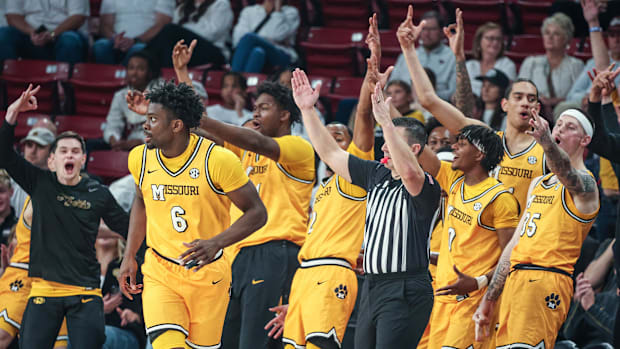 Missouri Tigers bench reacts after a three point basket from guard Annor Boateng.