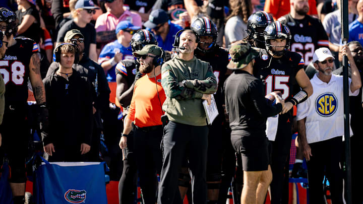 Florida Gators head coach Billy Napier looks at the scoreboard during the second half against the Arkansas Razorbacks at Steve Spurrier Field at Ben Hill Griffin Stadium in Gainesville, FL on Saturday, November 4, 2023. [Matt Pendleton/Gainesville Sun]