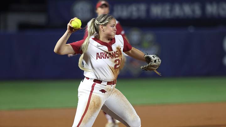 May 9, 2024; Auburn, AL, USA;   Arkansas Razorbacks third baseman Hannah Gammill (20) throws to first in the quarterfinals of the SEC Softball Championship at Jane B. Moore Field. Mandatory Credit: John Reed-USA TODAY Sports