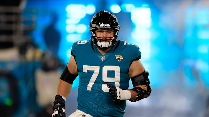 Jacksonville Jaguars center Luke Fortner (79) runs onto the field before an NFL first round playoff football matchup Saturday, Jan. 14, 2023 at TIAA Bank Field in Jacksonville, Fla. The Jacksonville Jaguars edged the Los Angeles Chargers on a field goal 31-30. [Corey Perrine/Florida Times-Union]

Jki 011423 Chargers Jags Cp 101