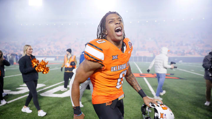 Oct 28, 2023; Stillwater, Oklahoma, USA; Oklahoma State Cowboys running back Ollie Gordon II (0) celebrates after a college football game between Oklahoma State and Cincinnati at Boone Pickens Stadium. Oklahoma State won 45-13.