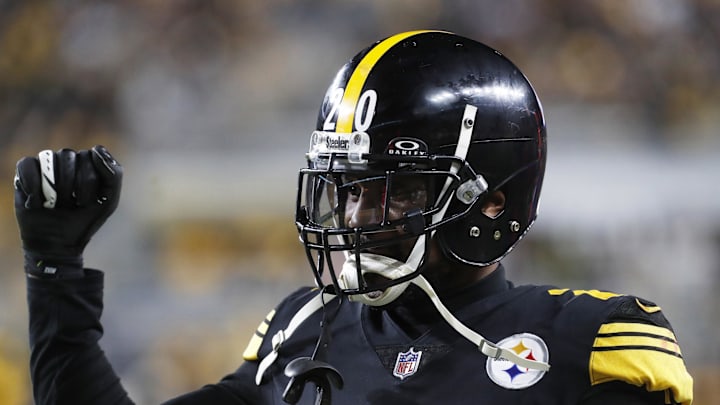 Dec 7, 2023; Pittsburgh, Pennsylvania, USA;  Pittsburgh Steelers cornerback Patrick Peterson (20) celebrates a blocked punt against the New England Patriots during the fourth quarter at Acrisure Stadium. New England won 21-18. Mandatory Credit: Charles LeClaire-Imagn Images