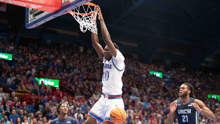 Kansas Jayhawks forward Flory Bidunga (40) dunks the ball against North Carolina-Wilmington Seahawks during the first half of the game inside Allen Fieldhouse Tuesday, Nov. 19, 2024. Kansas Jayhawks forward Flory Bidunga (40) dunks the ball against North Carolina-Wilmington Seahawks during the first half of the game inside Allen Fieldhouse Tuesday, Nov. 19, 2024.