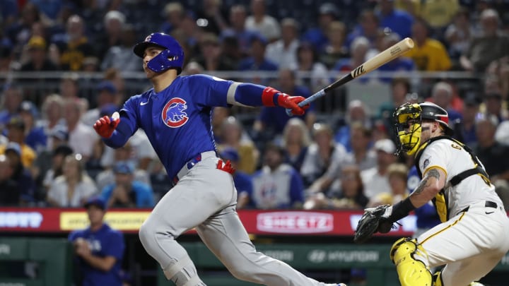 Aug 26, 2024; Pittsburgh, Pennsylvania, USA;  Chicago Cubs catcher Miguel Amaya (9) hits a two run double against the Pittsburgh Pirates during the sixth inning at PNC Park.