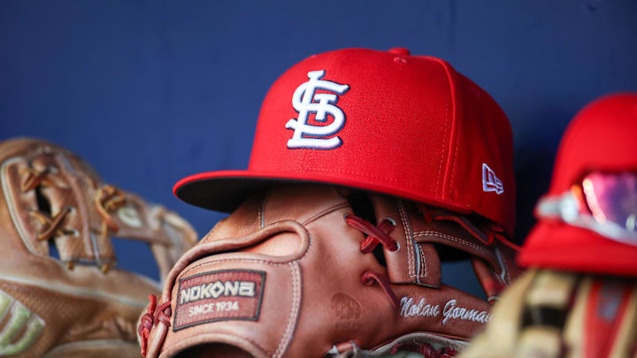 Sep 5, 2023; Atlanta, Georgia, USA; A detailed view of the hat and glove of St. Louis Cardinals second baseman Nolan Gorman (not pictured) before a game against the Atlanta Braves at Truist Park. Mandatory Credit: Brett Davis-Imagn Images