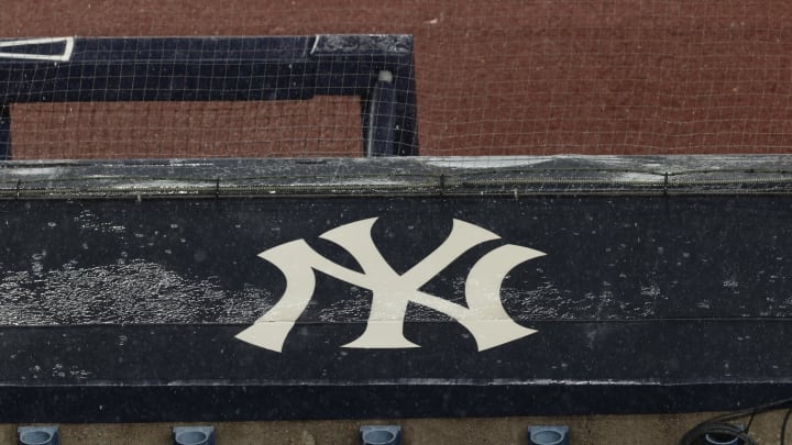 Aug 17, 2020; Bronx, New York,Insider Believes Yankees Should've Made This Impact Move at Trade DeadlineUSA; A general view of rain falling on the  New York Yankees logo on the first base dugout roof during a rain delay in the game between the New York Yankees and the Boston Red Sox. Mandatory Credit: Vincent Carchietta-USA TODAY Sports