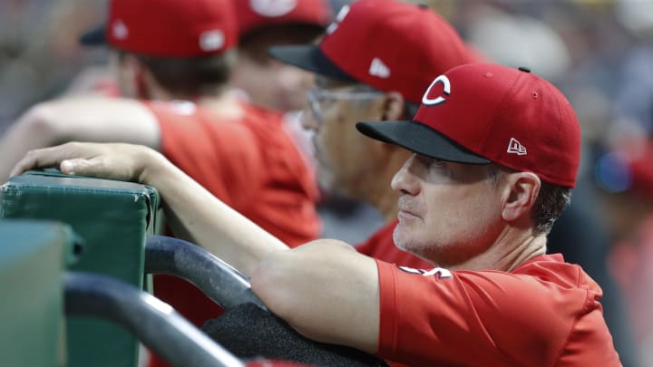 Jun 17, 2024; Pittsburgh, Pennsylvania, USA;  Cincinnati Reds manager David Bell (25) looks on from the dugout against the Pittsburgh Pirates during the sixth inning at PNC Park. Mandatory Credit: Charles LeClaire-USA TODAY Sports