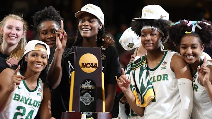 Apr 7, 2019; Tampa, FL, USA; Baylor Lady Bears guard Chloe Jackson (24),  forward Lauren Cox (15), center Kalani Brown (21),  guard DiDi Richards (2) and teammates celebrate after defeating Notre Dame Fighting Irish to win the championship game of the women's Final Four of the 2019 NCAA Tournament at Amalie Arena. Mandatory Credit: Kim Klement-Imagn Images