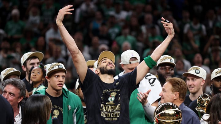 Jun 17, 2024; Boston, Massachusetts, USA; Boston Celtics forward Jayson Tatum (0) celebrates after winning the 2024 NBA Finals against the Dallas Mavericks