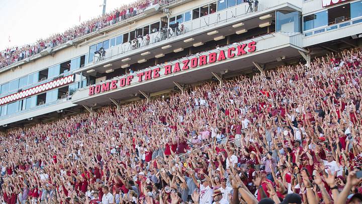 Aug 31, 2019; Fayetteville, AR, USA; Arkansas Razorbacks fans "call the hogs" during the third quarter of the game against the Portland State Vikings at Donald W. Reynolds Razorback Stadium. Mandatory Credit: Brett Rojo-USA TODAY Sports