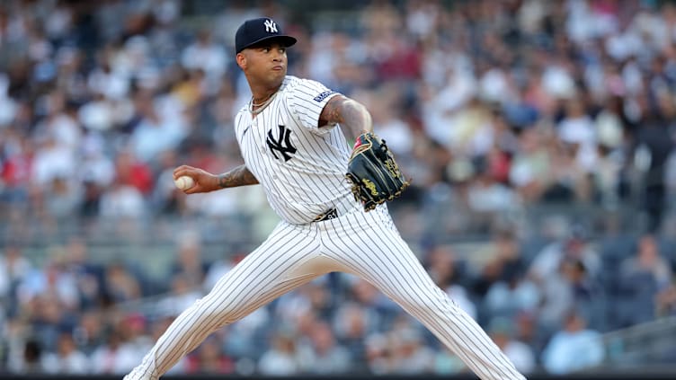 Jul 2, 2024; Bronx, New York, USA; New York Yankees starting pitcher Luis Gil (81) pitches against the Cincinnati Reds during the second inning at Yankee Stadium. Mandatory Credit: Brad Penner-USA TODAY Sports