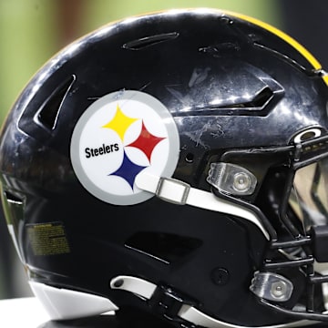 Aug 9, 2024; Pittsburgh, Pennsylvania, USA;  A Pittsburgh Steelers helmet sits on an equipment trunk during the game against the Houston Texans during the fourth quarter at Acrisure Stadium. Mandatory Credit: Charles LeClaire-Imagn Images