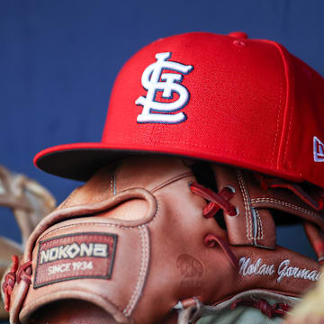 Sep 5, 2023; Atlanta, Georgia, USA; A detailed view of the hat and glove of St. Louis Cardinals second baseman Nolan Gorman (not pictured) before a game against the Atlanta Braves at Truist Park. Mandatory Credit: Brett Davis-Imagn Images