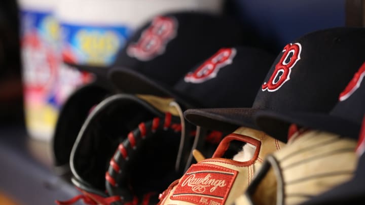 May 22, 2018; St. Petersburg, FL, USA; A general view of Boston Red Sox hats and gloves laying in the dugout at Tropicana Field. Mandatory Credit: Kim Klement-USA TODAY Sports