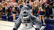 Gonzaga opted into college athletics' new revenue-sharing model for this season and will transition to the Pac-12 conference in July 2026.