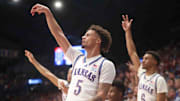 Kansas Jayhawks guard Zeke Mayo watches his three-point attempt during an exhibition game against Washburn.