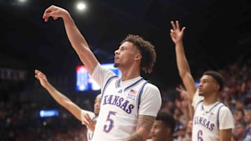 Kansas Jayhawks guard Zeke Mayo watches his three-point attempt during an exhibition game against Washburn.