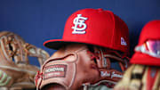 Sep 5, 2023; Atlanta, Georgia, USA; A detailed view of the hat and glove of St. Louis Cardinals second baseman Nolan Gorman (not pictured) before a game against the Atlanta Braves at Truist Park. Mandatory Credit: Brett Davis-Imagn Images