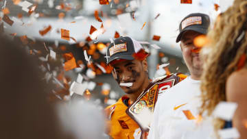 Jan 1, 2024; Orlando, FL, USA; Tennessee Volunteers quarterback Nico Iamaleava (8) poses with the MVP Trophy after defeating the Iowa Hawkeyes at Camping World Stadium. Mandatory Credit: Morgan Tencza-USA TODAY Sports