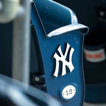 Jul 12, 2020; Bronx, New York, United States; A view of the  New York Yankees logo and seat number of an empty seat during a simulated game during summer camp workouts at Yankee Stadium. Mandatory Credit: Vincent Carchietta-Imagn Images